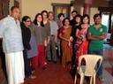 Participants of the cluster meeting with the cast and crew on the sets of a local film production